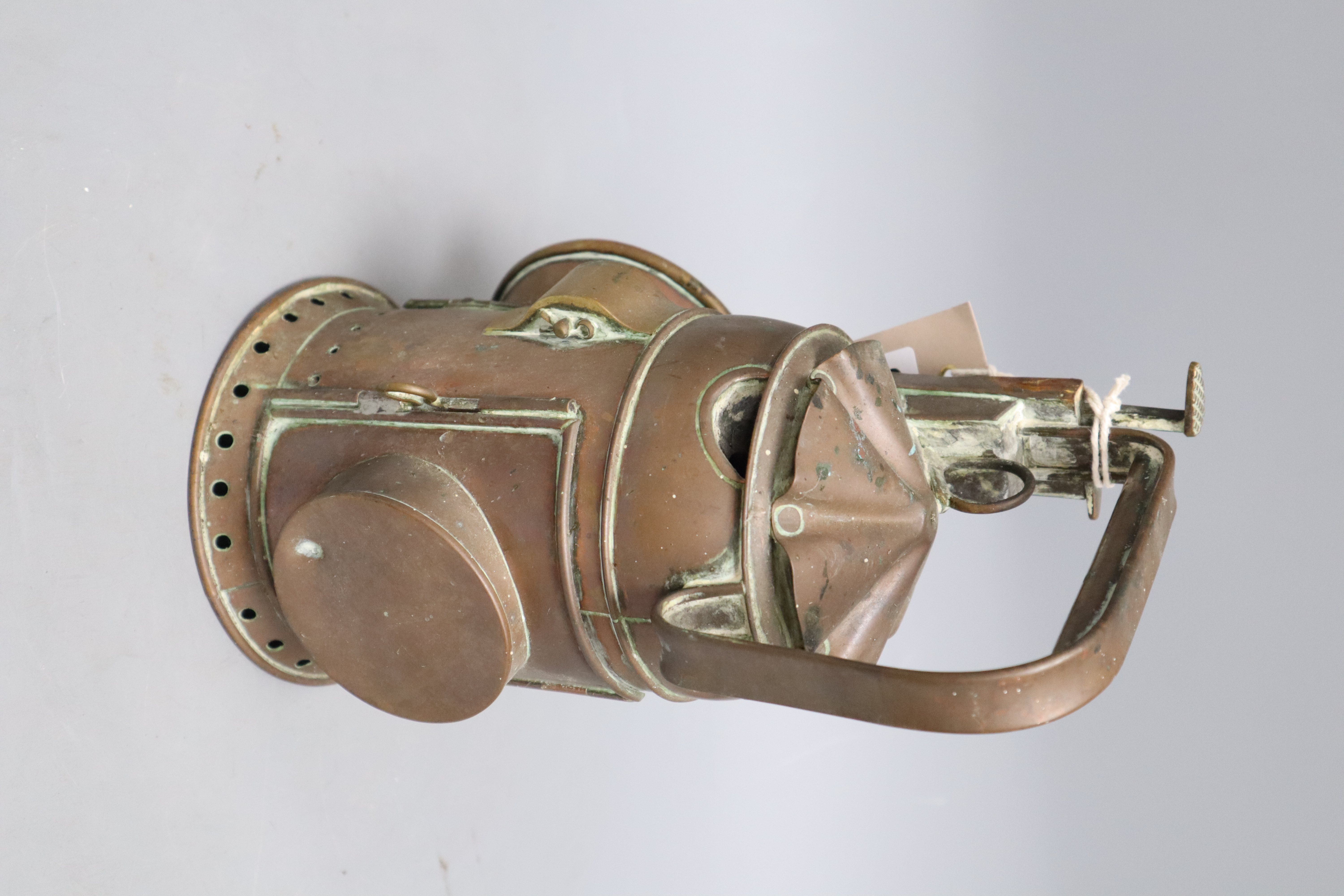 An R. Brown & Sons copper railway lamp, height 25cm